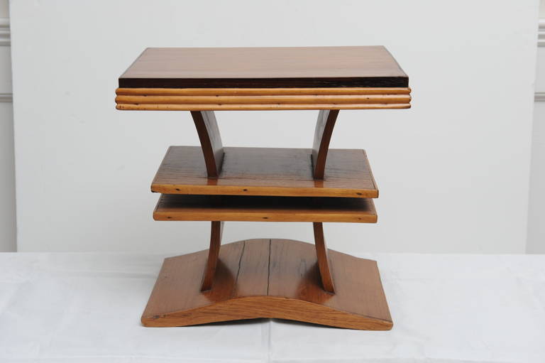 Deco period rosewood and Burmese teak stand has a great sculptural quality. It can also be used as a stool.