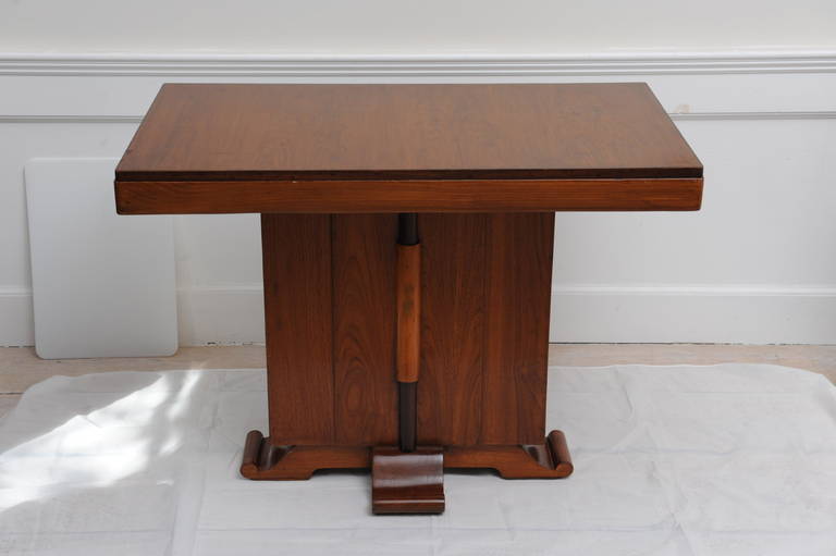 Deco period table made of mahogany, rosewood and teak. Great style details and versatile use a table to sit at as a desk or dining or console table in a hallway or room or used behind a sofa. The deco base is complete on all four sides.

Shop