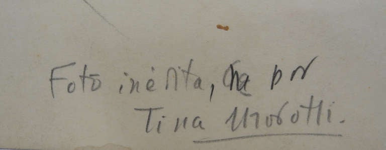 Photograph of Lola Cueto by Tina Modotti with a technical intervention of a white line around of the silhouette, provably made by Cueto her self. Singed by the artist in the left corner of the picture.