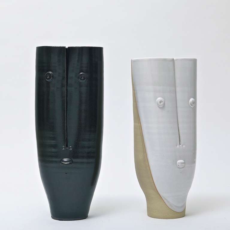 A very decorative pair of glazed earthenware vases, signed by the french artists, and front decorated with incised and modeled visages.

DAniel Derock and LOïc de Bailliencourt, the DALO, work together in Paris since 2007.
Their unique pieces, a