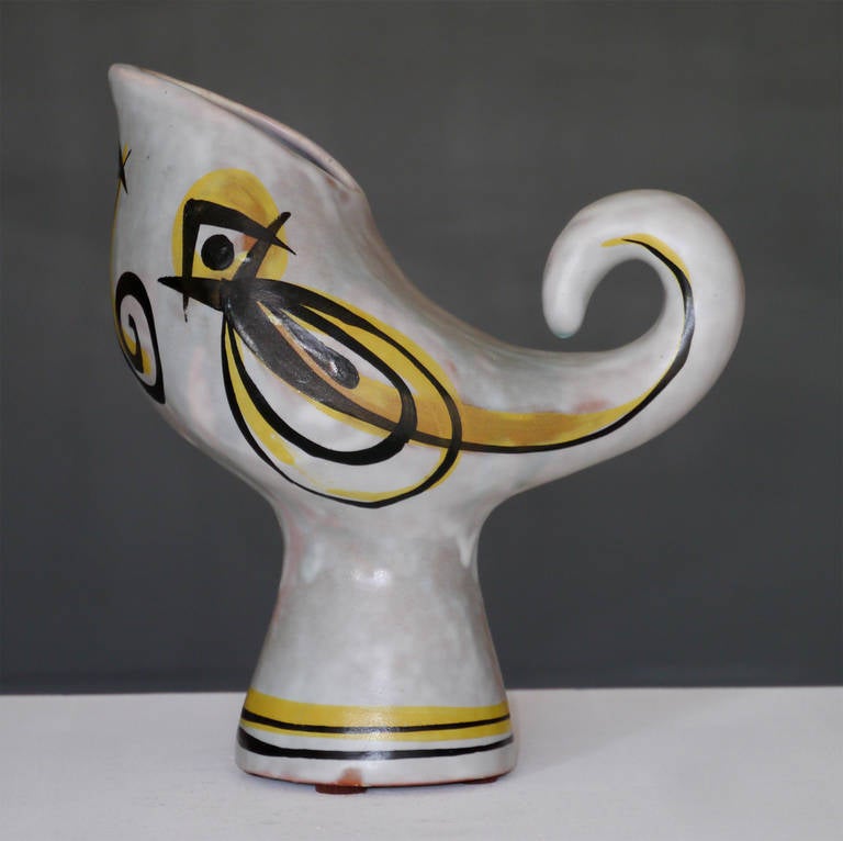 A rare zoomorphic piece.

Matte glazes on white faience coated with red slip.

Signed by the artist on base.

This piece was part of the selection of the Sèvres ceramic national museum and was exhibited in 2003 during the retrospective of