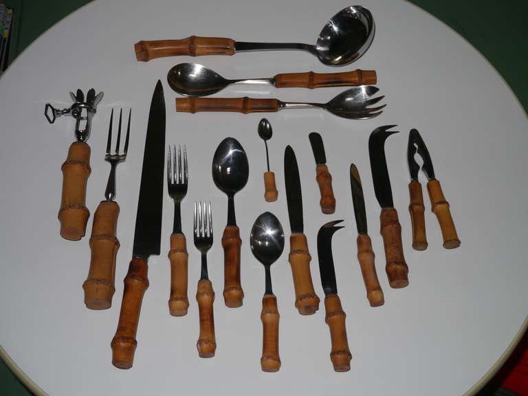 A complete set for twelve guests in stainless steel with their original bamboo handles.

Name of manufacturer stamped on knives's blades

A total of 101 pieces :

14 dinner forks
12 salad or desert forks
14 dinner knives
12 cheese