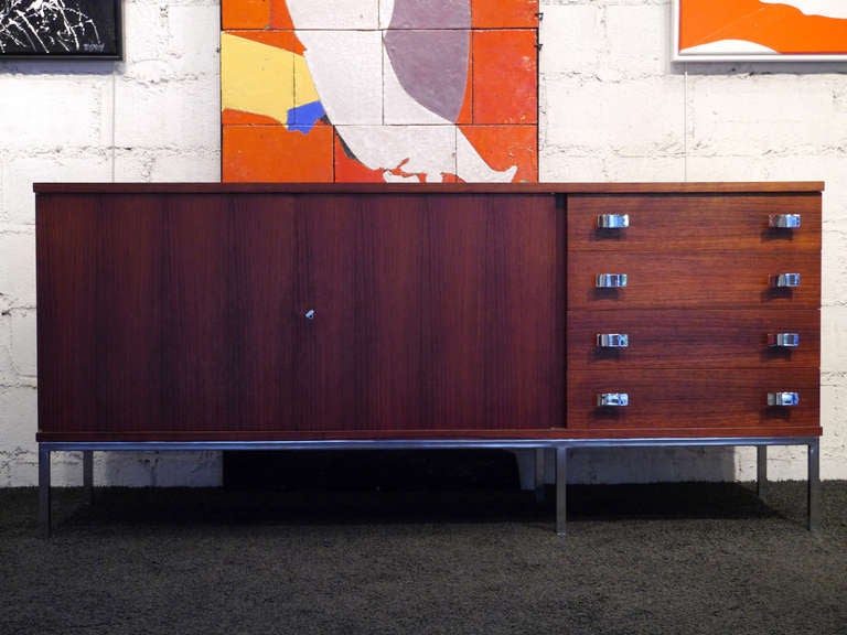 Sideboard A24, element of juxtaposable chests created by Antoine Philippon and Jacqueline Lecoq for Degorre.
Palisander, cherry wood and chromed steel.

We offer three elements of this line which come from the same location, even if pictures show