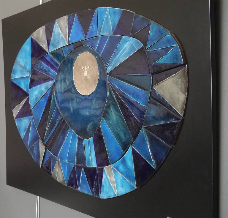 Segmented glazed lava inlayed in a lacquered wood for highly sophisticated effect that reveal the beautiful blue shades of the glazes.
this one-of-a-kind piece of art was specially dedicated to decorate Capron's booth for an international