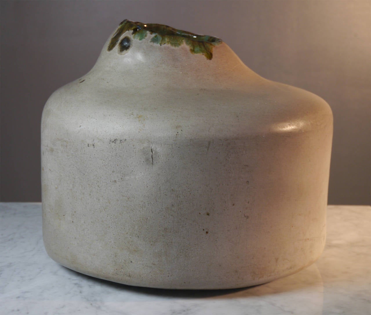 Unique and massive vase dated 1978 from the shape range.

Manganese black earth with smoked grey satin glazes and shiny green brown interior.

Known for his involvement in French artists defense and active member of the "Atelier des Métiers