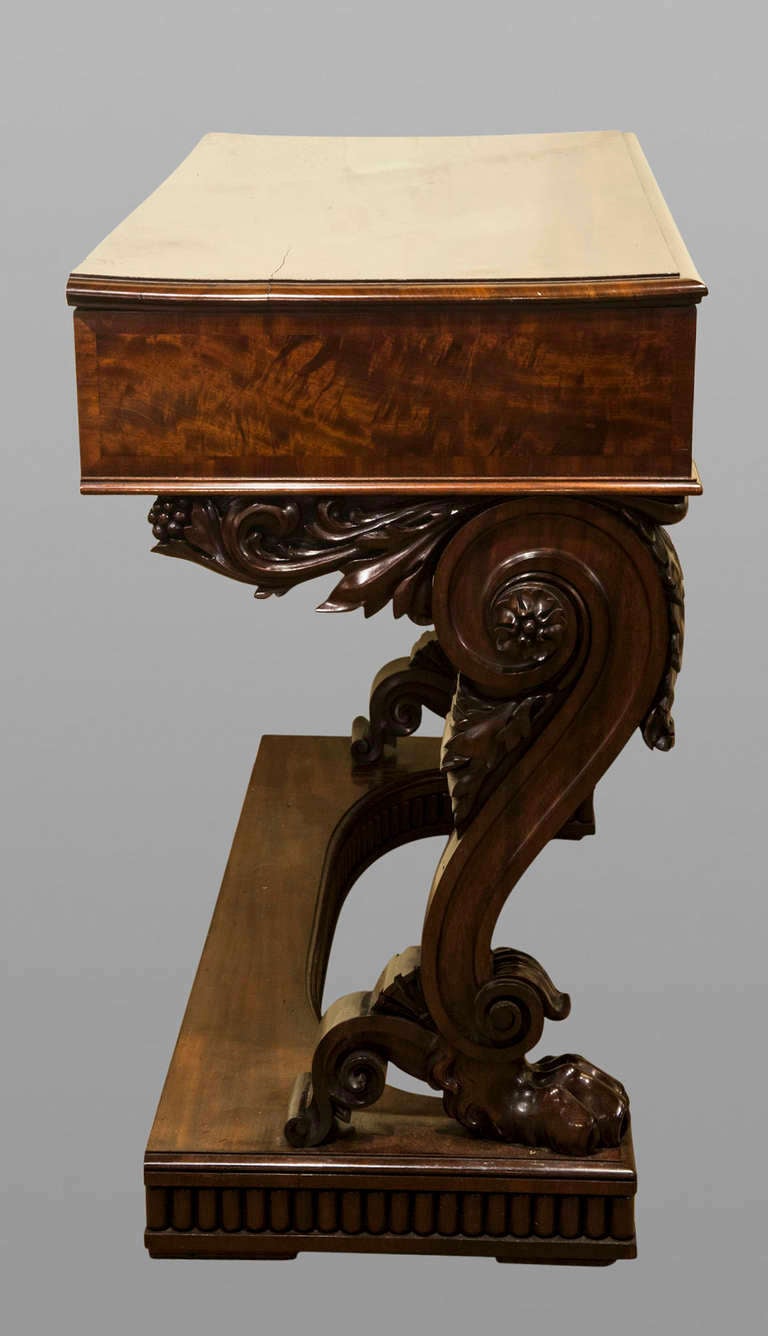 An elaborately carved mahogany console table of large proportions commissioned for Thomas case, Mayor of Liverpool. Attributed to Gillows,

 circa 1835.
 