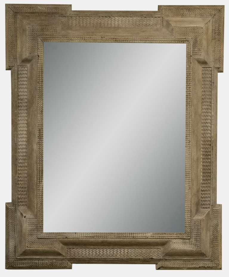 A 19th Century rectangular mirror in the Gustavian taste with decorative carved mouldings and frame