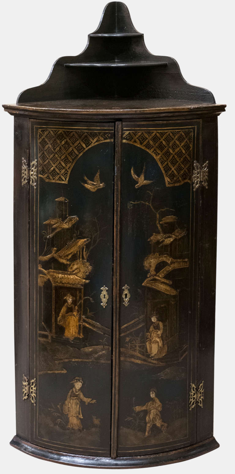 A fine early Georgian Japanned, Floor Standing corner cabinet with Pagoda style shelving to the top