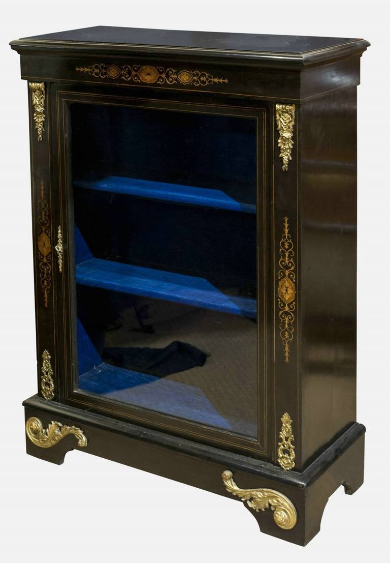 An attractive late 19th Century ebonised pier cabinet with inlaid and ormolu decoration.
