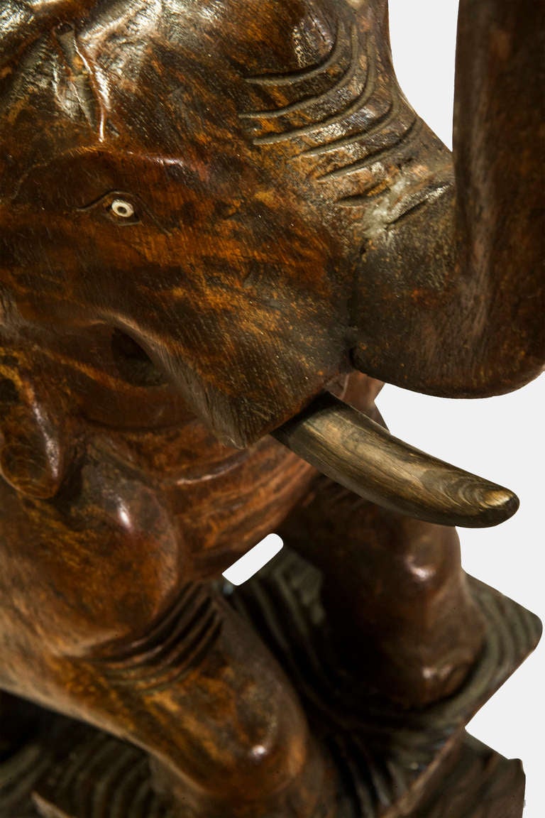 A Beautiful Pair Of Carved Hardwood Elephants Standing On Plinths.