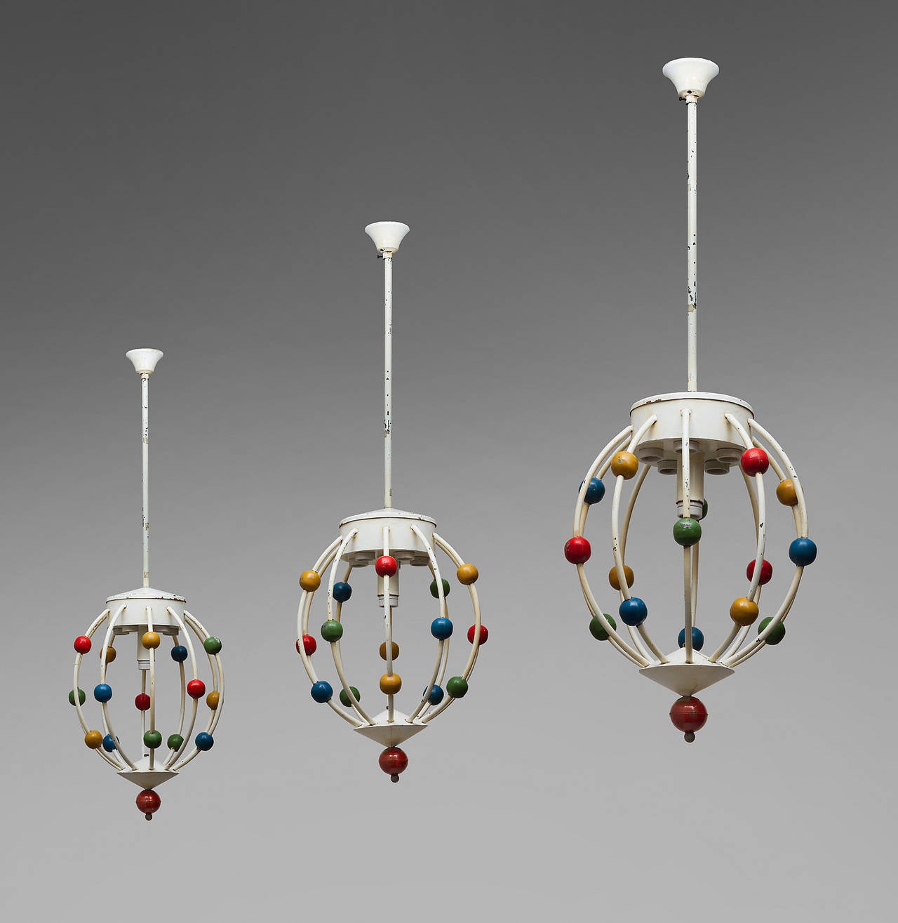 Exceptional set of 11 ceiling lights, 
Italy, circa 1960-1970.
Painted wrought iron and iron sheet.
Seven models with a bar and four without.
Six lights in the upper part in each piece.