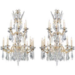 Pair of Italian bronze and crystal chandeliers. Second half of 19th century