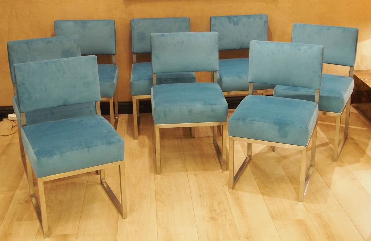 Set of eight dining room chairs,
 made by a French architect on a special order,
stainless steel,
completely reupholstered with a nice turquoise fabric,
 France, circa 1965-1970.