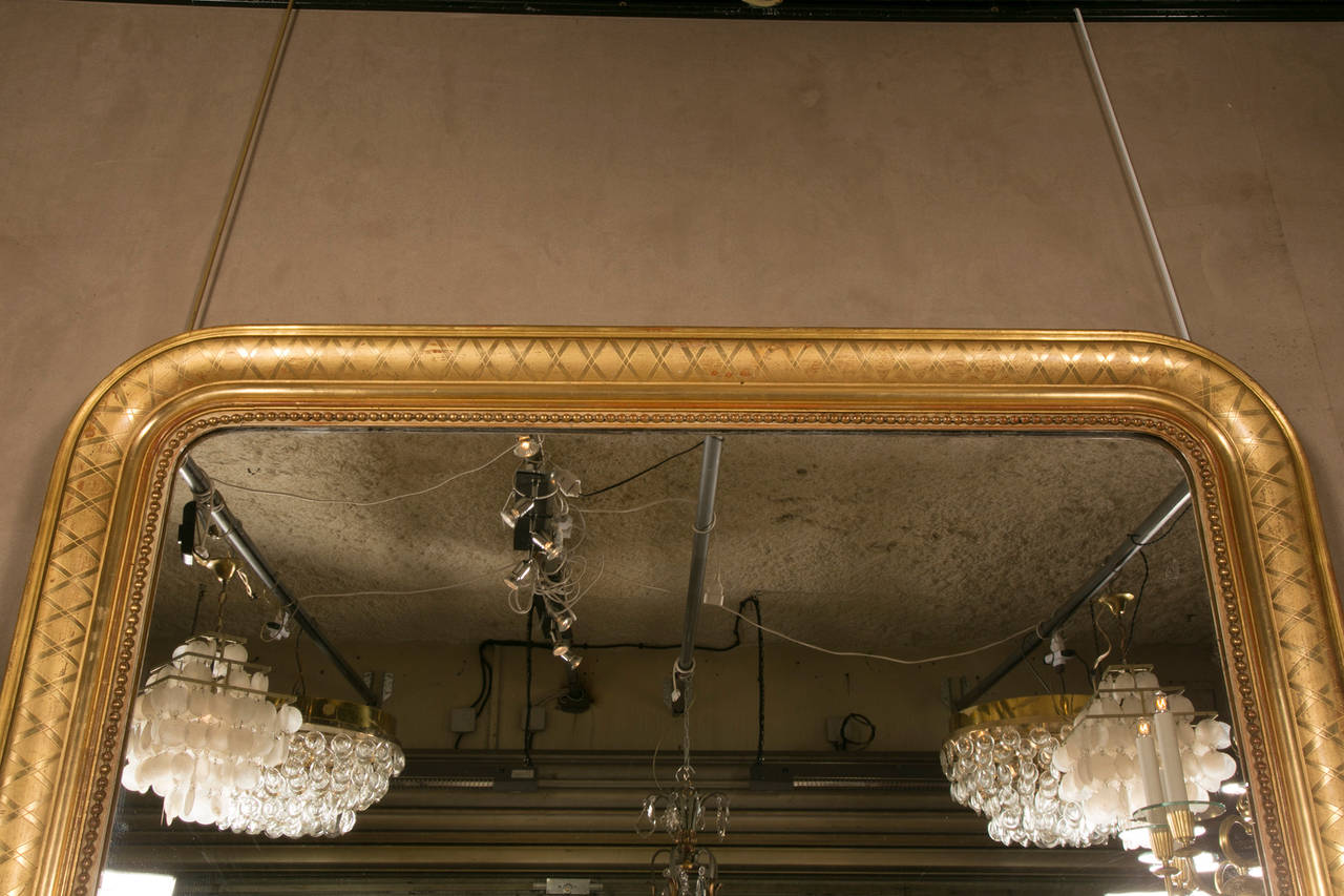 19th c. Large Mantel Giltwood Mirror In Good Condition For Sale In Saint-Ouen, FR