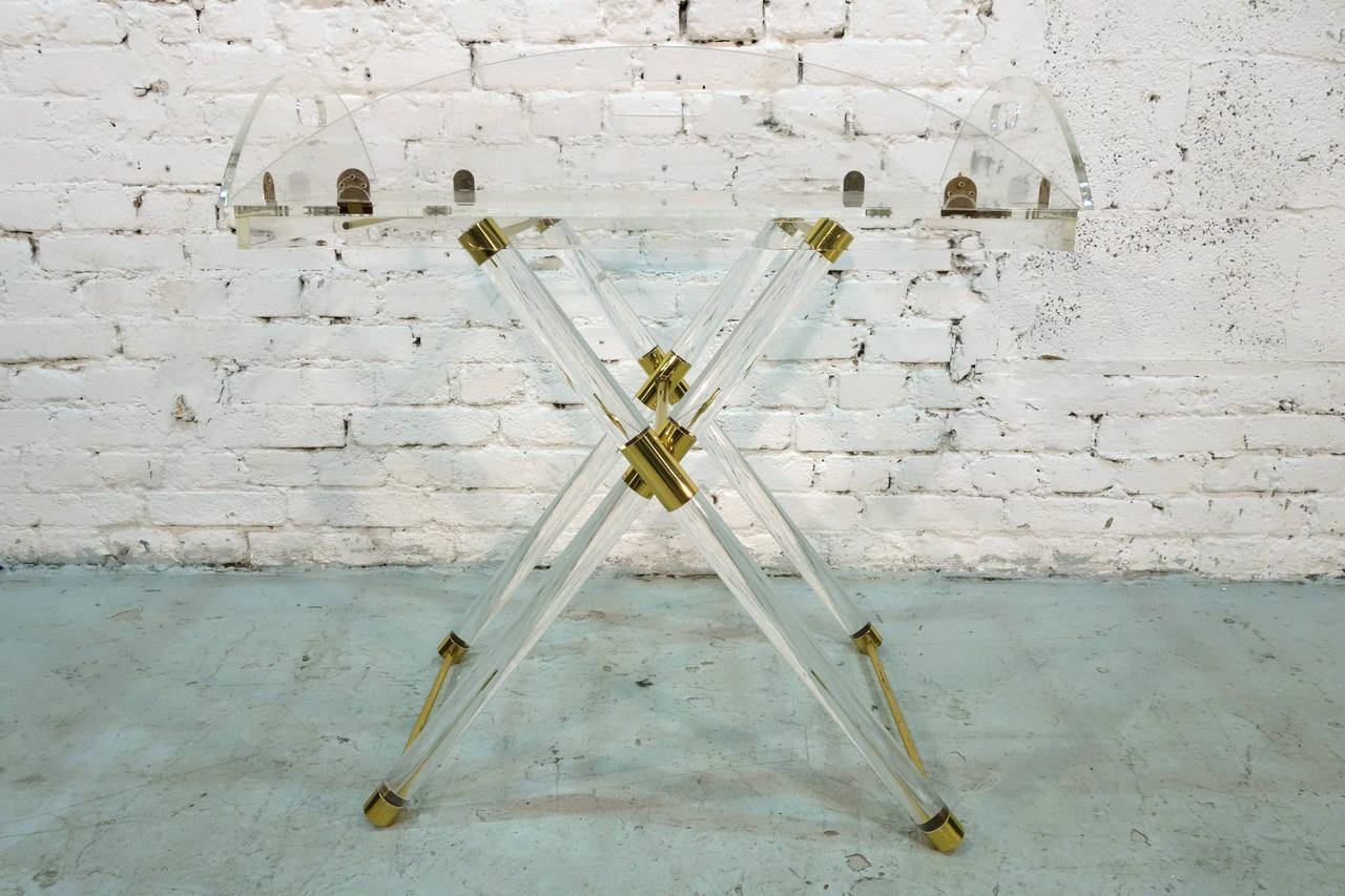 Lucite X-base bar table with gilded metal elements.
Tray removable.