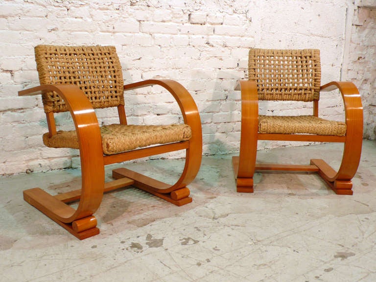 Pair of armchairs by Audoux - Minet for Vibo with braided rope seats. 
Stamped on underside (see picture)