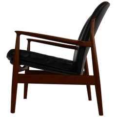Fauteuil de salon en teck et cuir de Finn Juhl pour France et Daverkosen