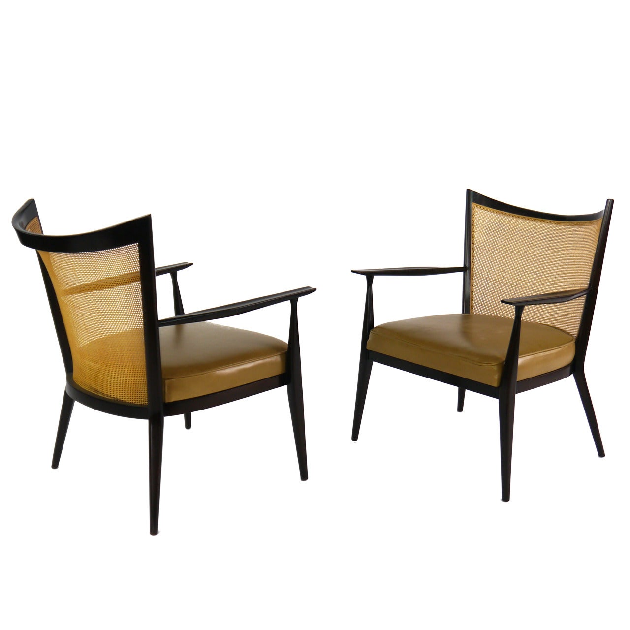 Elegant Lounge Chairs in Cane and Leather by Paul Mccobb