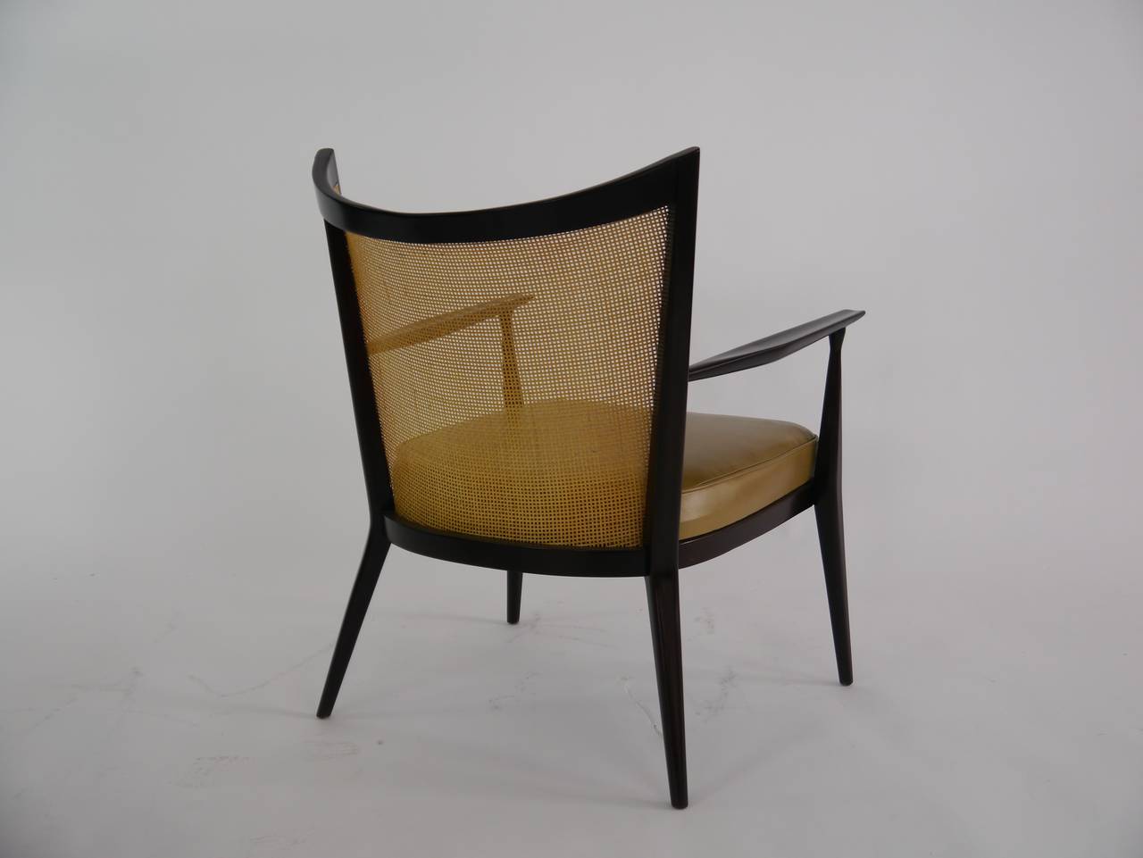 Mid-20th Century Elegant Lounge Chairs in Cane and Leather by Paul Mccobb
