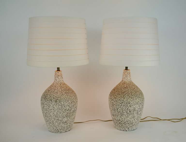 Pair of mid century volcanic glaze lamps.