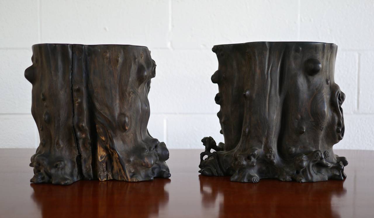 Unusual Chinese zitan root brush pots. Each hand-carved with highly figured burl elements and inclusions.