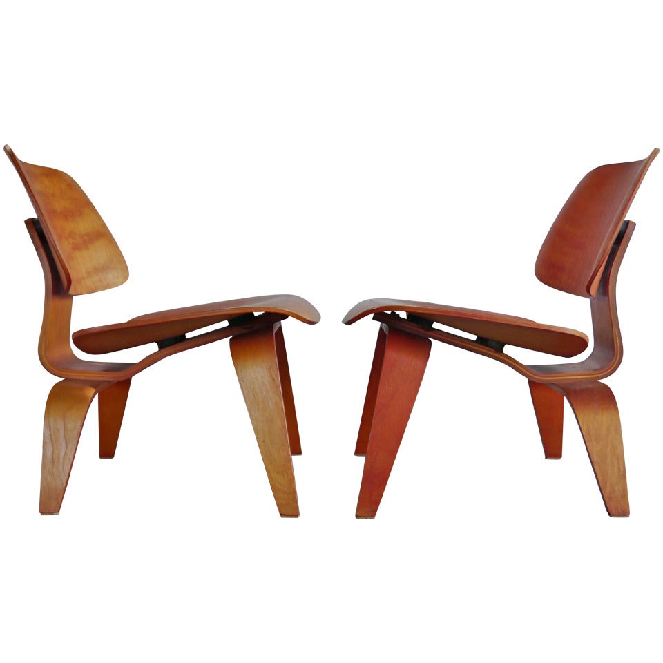 Pair of Early Red LCW Lounge Chairs by Charles Eames For Sale