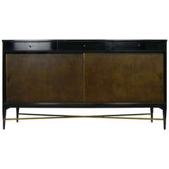 Paul McCobb credenza in Walnut, Leather and Brass