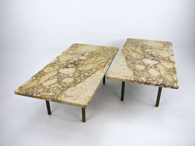 Pair Breccia Nouvelle marble tables with brass legs. Very interesting ornate marble tops. The tops are 