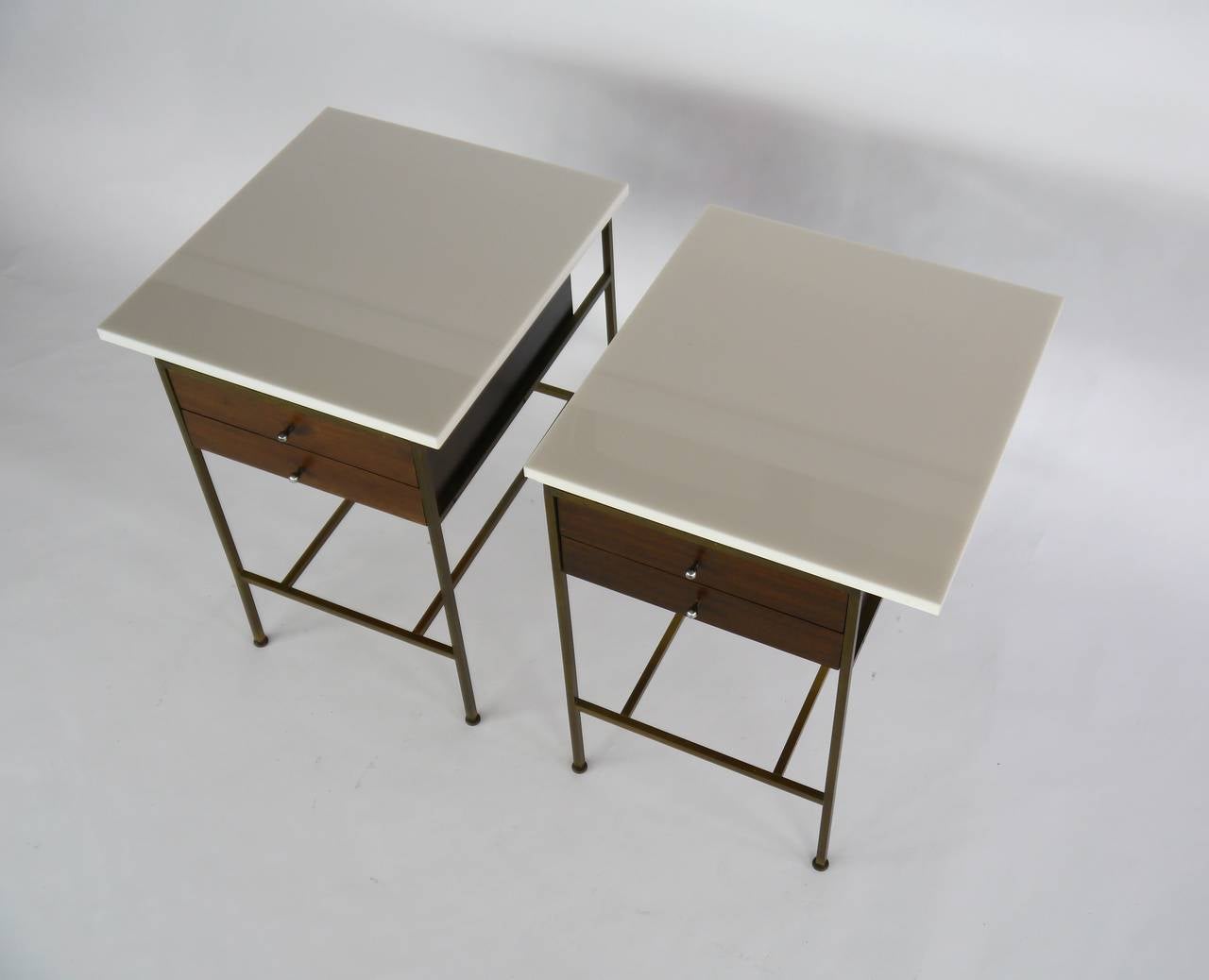 Pair of Paul McCobb Nightstands with Brass Frames and White Glass Tops