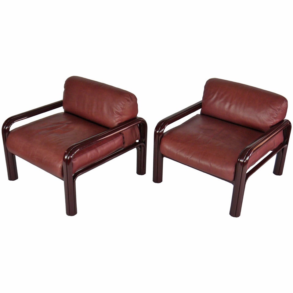 Lounge chairs in Oxblood leather by Gae Aulenti for Knoll