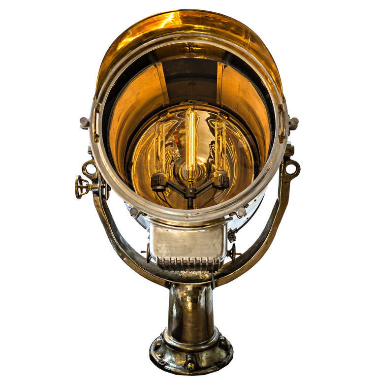Rare 1940s extra-large ocean liner search light. Very unique piece, fully restored and re-polished. Large solid bronze cast base.