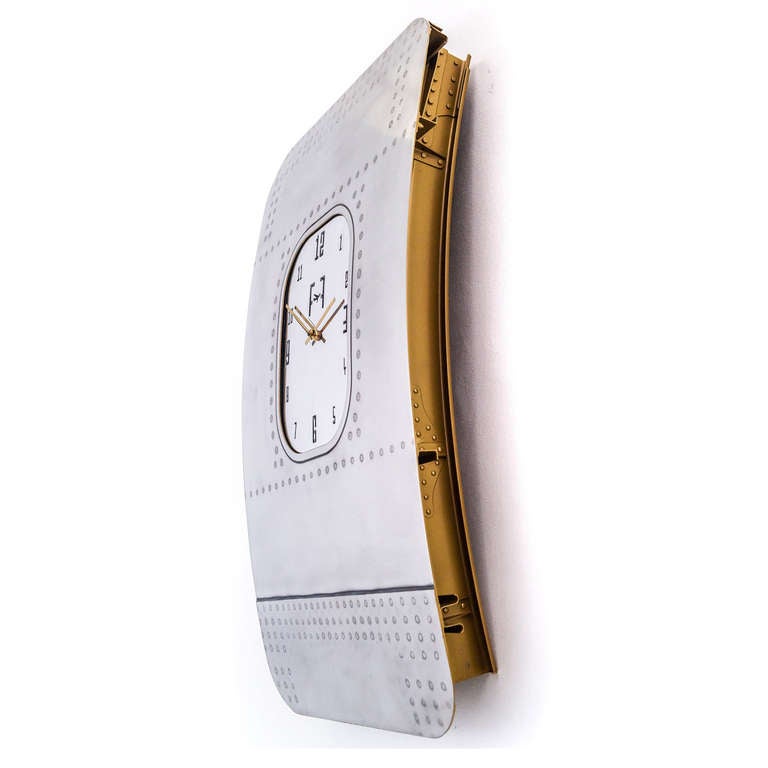 Taken from the fuselage of a Boeing 747 jumbo jet this section of fuselage has been finished to create a rustic, vintage beautiful timepiece.

The clock face consists of an original aluminium cargo aircraft window, with the numbers laser cut and