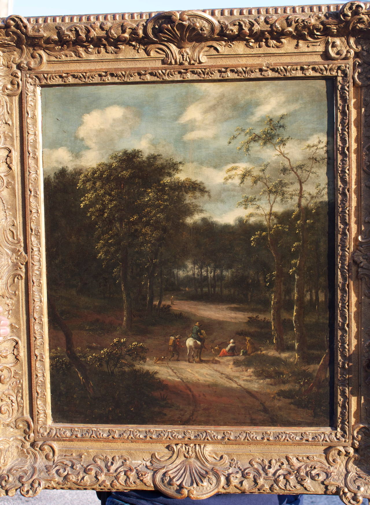 17thc. Dutch School, Forest Interior with Travelers at Rest - Black Landscape Painting by Unknown