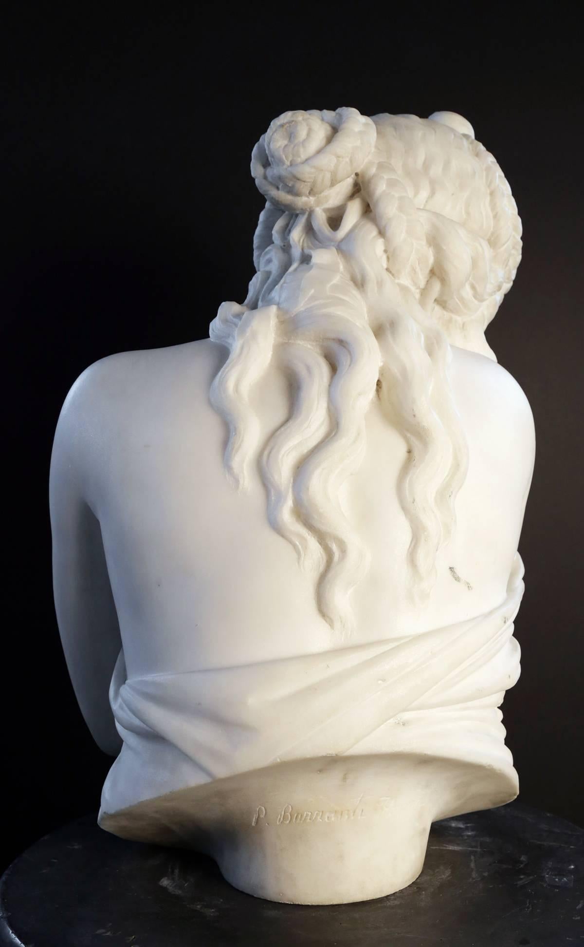 Pieter Barranti (Italian 19th century)
Carved Marble Bust of a Demure Young Girl

The 3/4 life size carved marble bust in the form of a young girl turning her head and covering herself with her gown. 
Signed P. Barranti, Florence
20 in. h. x 15
