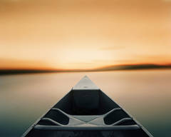 Paddling Toward a Single Point After Sunset