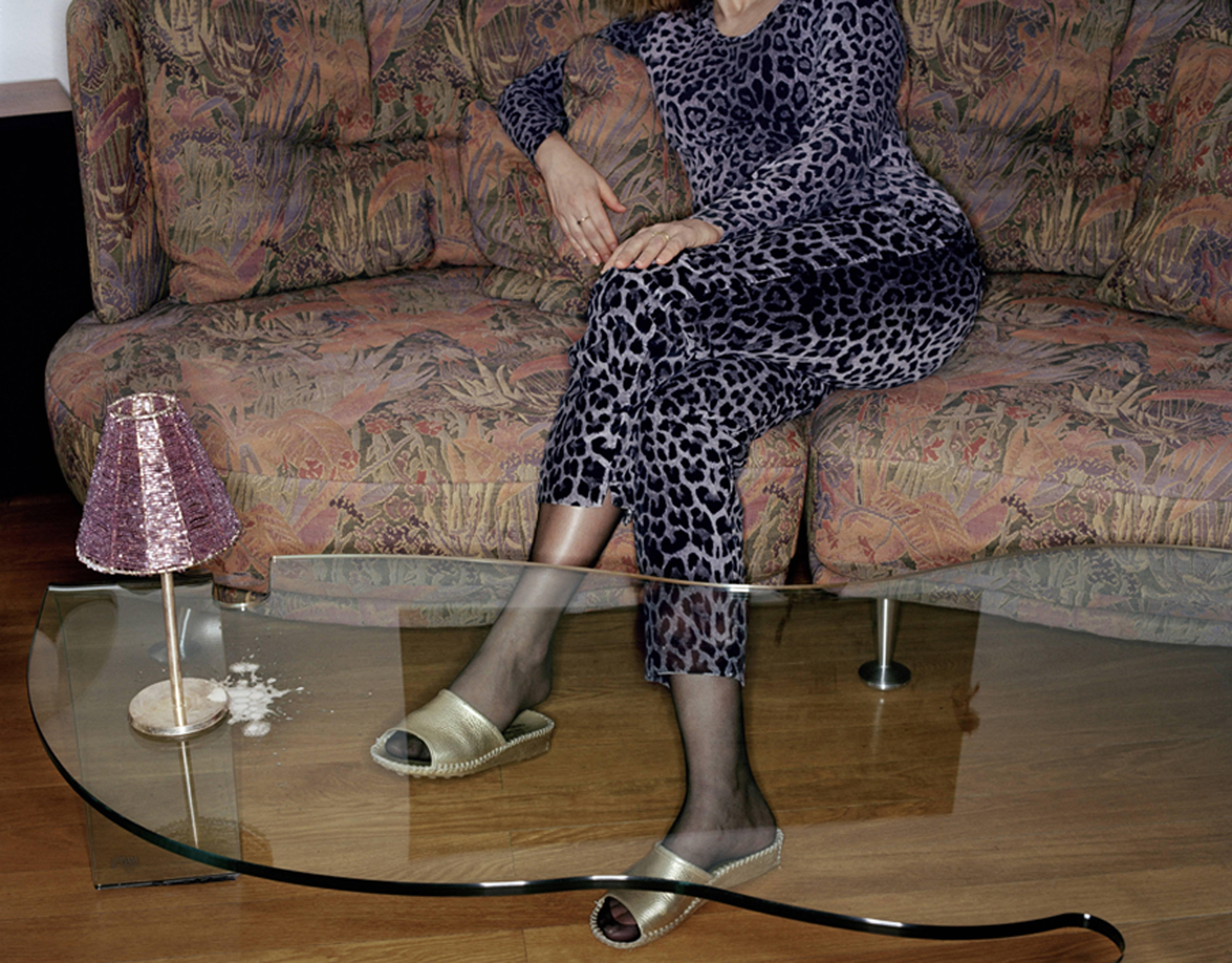 Woman on Sofa - Photograph by Christian Vogt