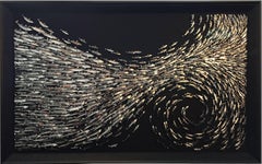 SURGE - A three dimensional art work of pinned metallic mackerel