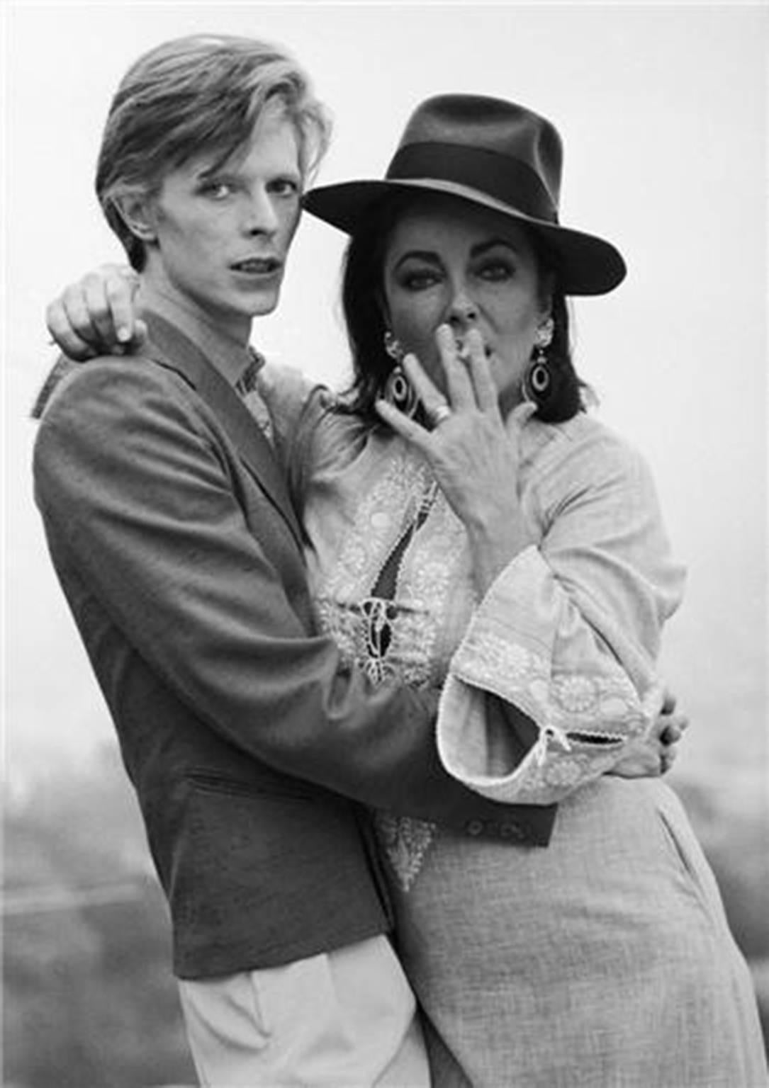 Terry O'Neill Portrait Photograph - David Bowie & Elizabeth Taylor