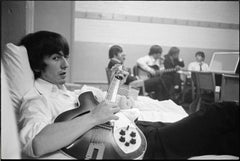George Harrison mit Gitarre