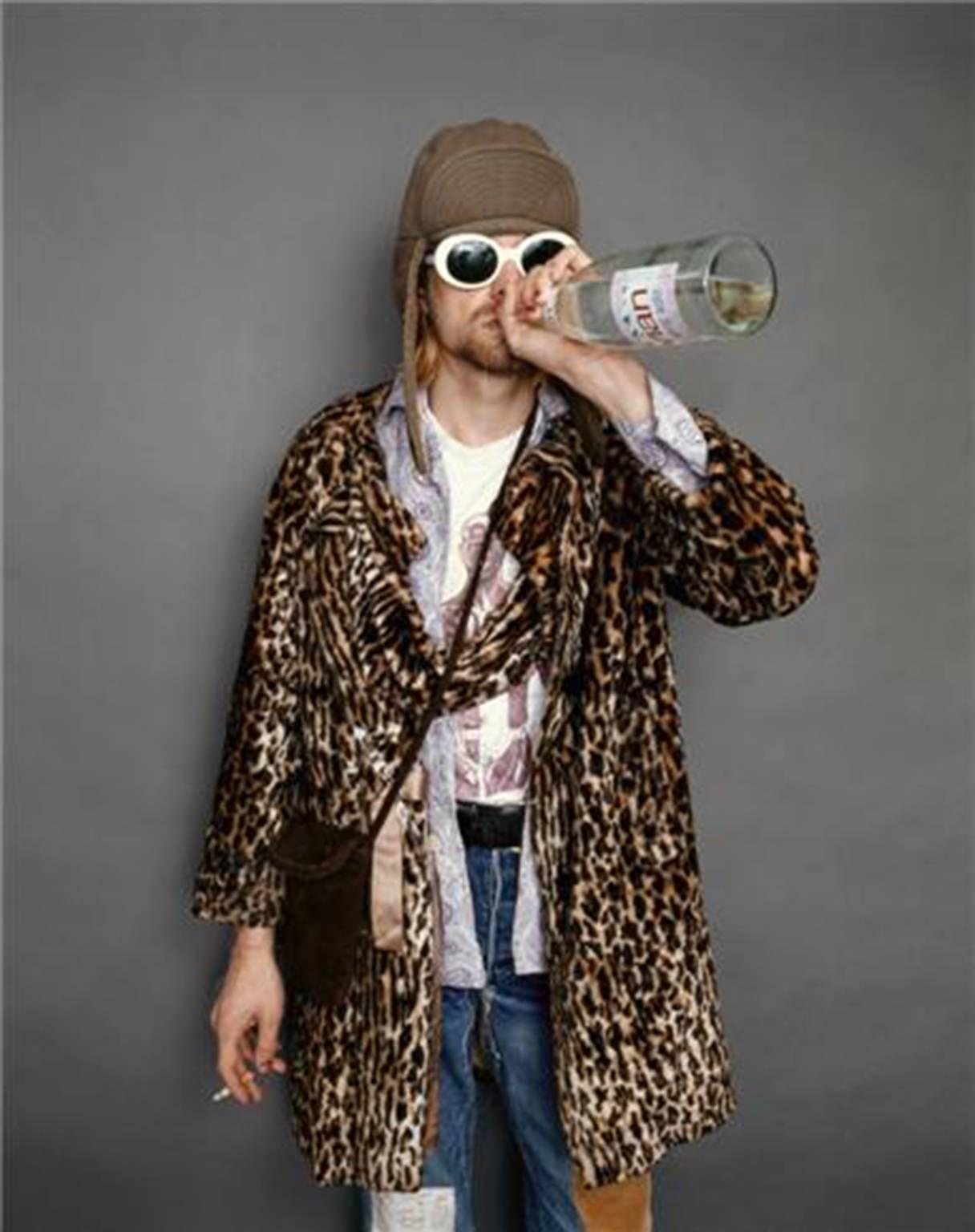 Jesse Frohman Portrait Photograph - Kurt Cobain; Drinking Evian water