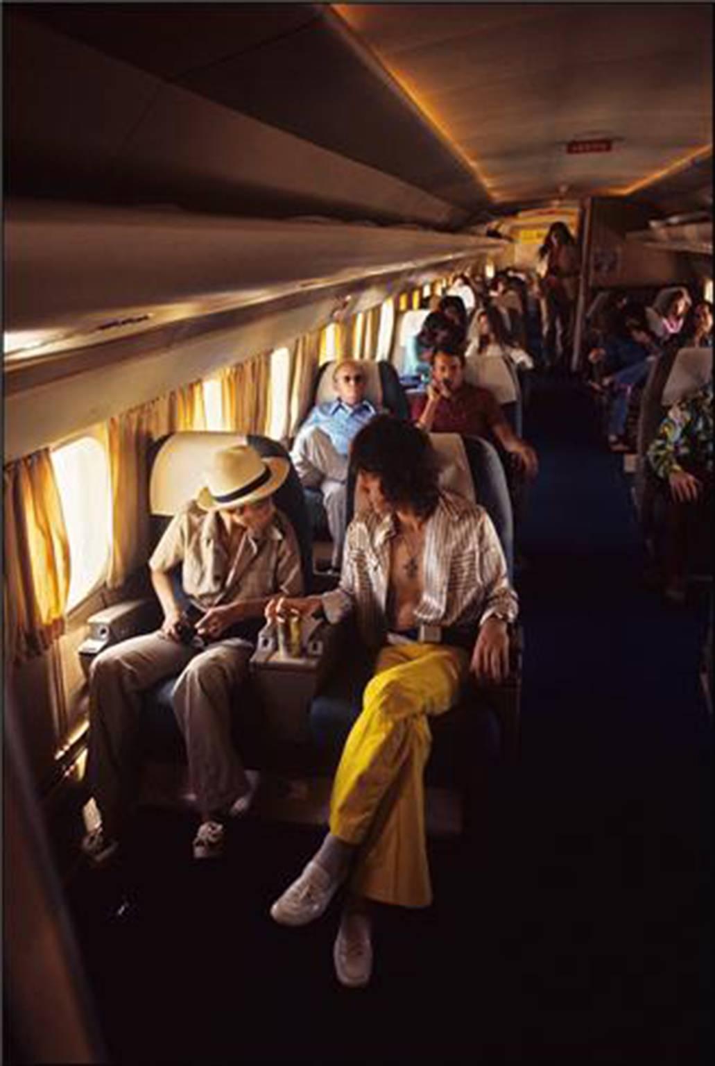 Ethan Russell Color Photograph - On Board the Rolling Stones Plane, 1972