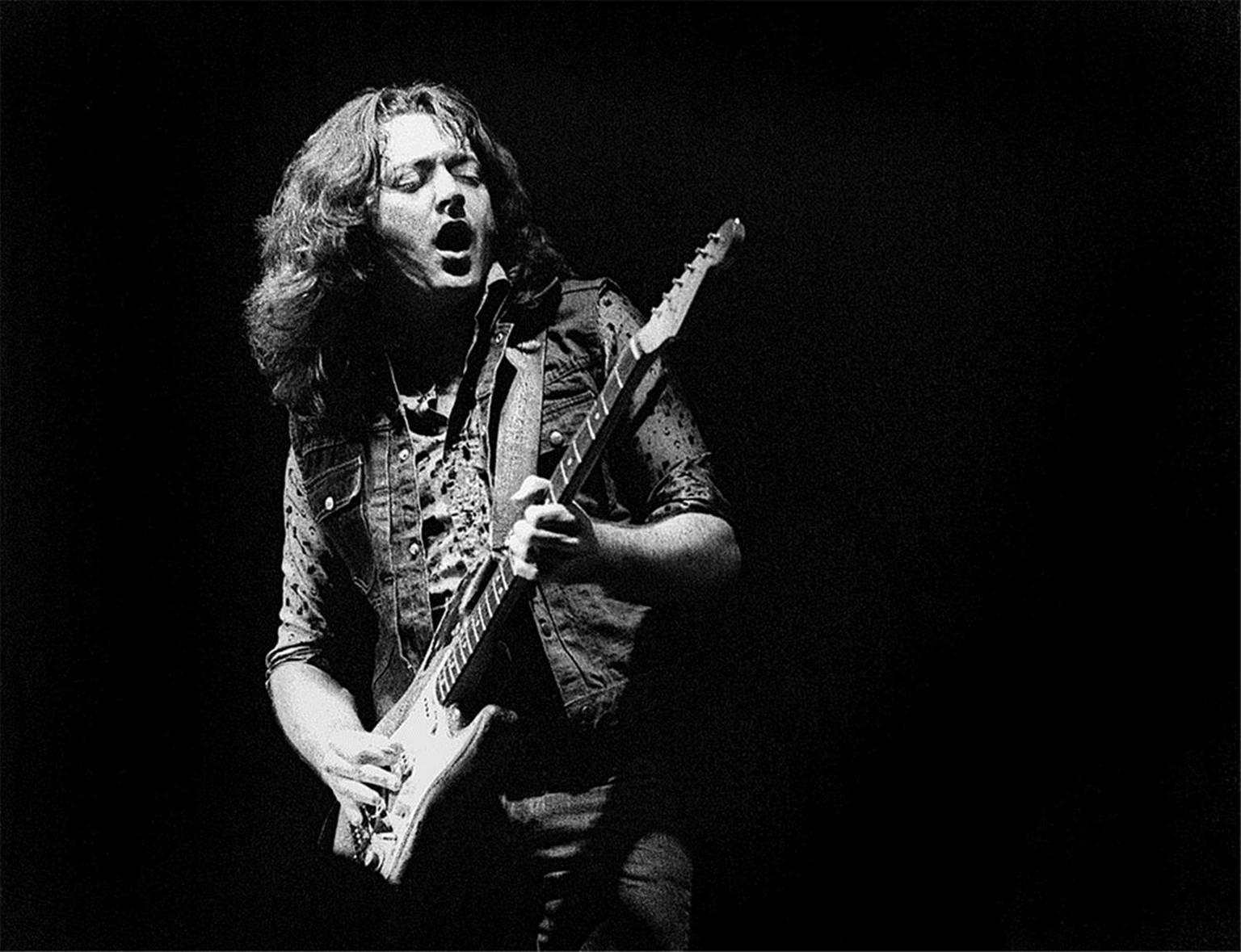 Colm Henry Black and White Photograph - Rory Gallagher, Dublin, 1981
