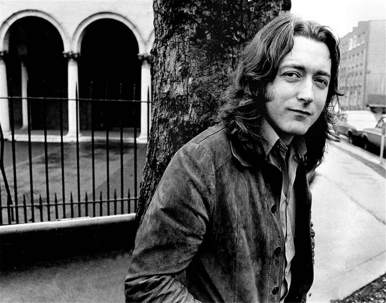 Colm Henry Black and White Photograph - Rory Gallagher, in Dublin city 1983