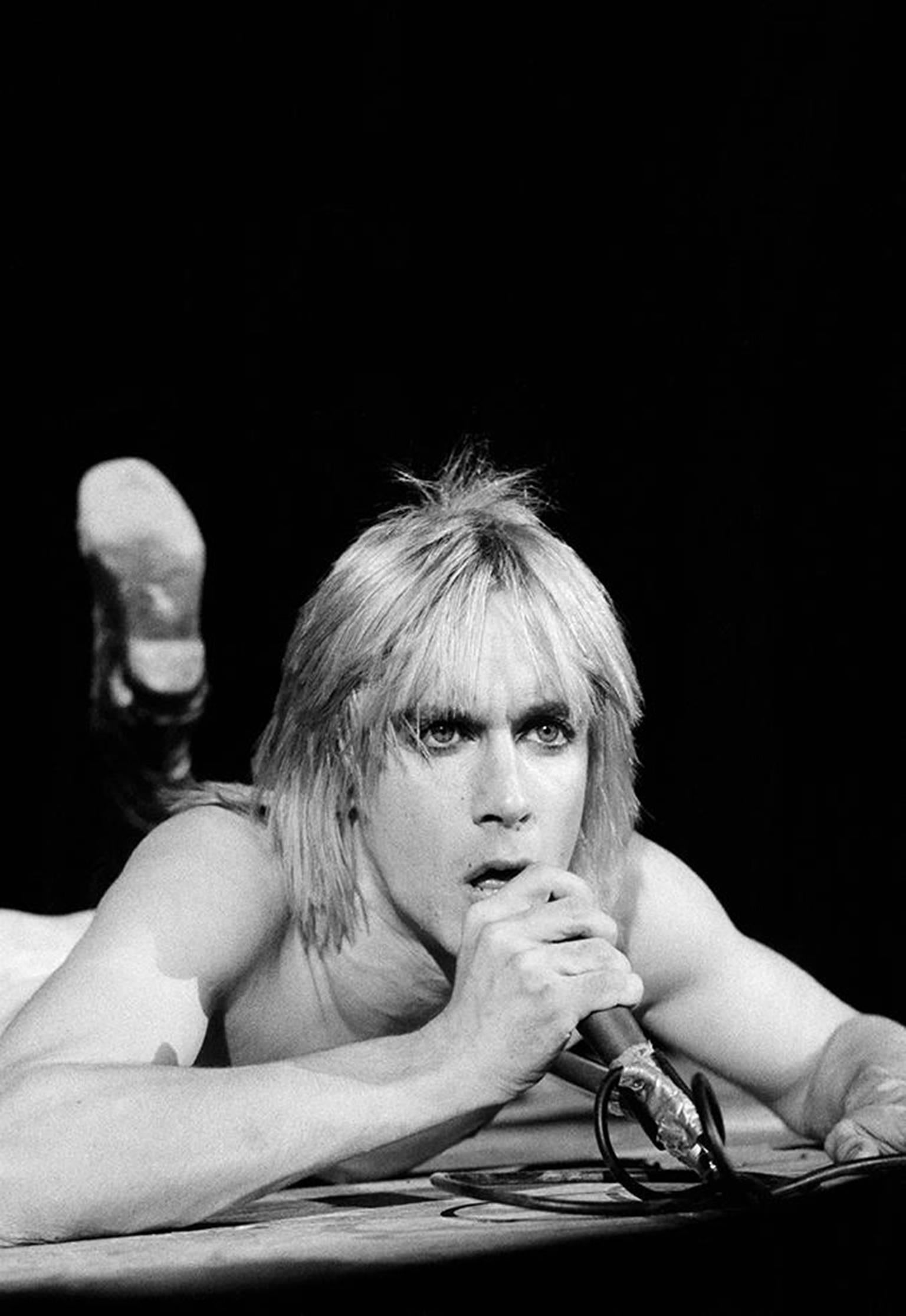 Bill Green Black and White Photograph - Iggy Pop Looking on the Floor, 1973