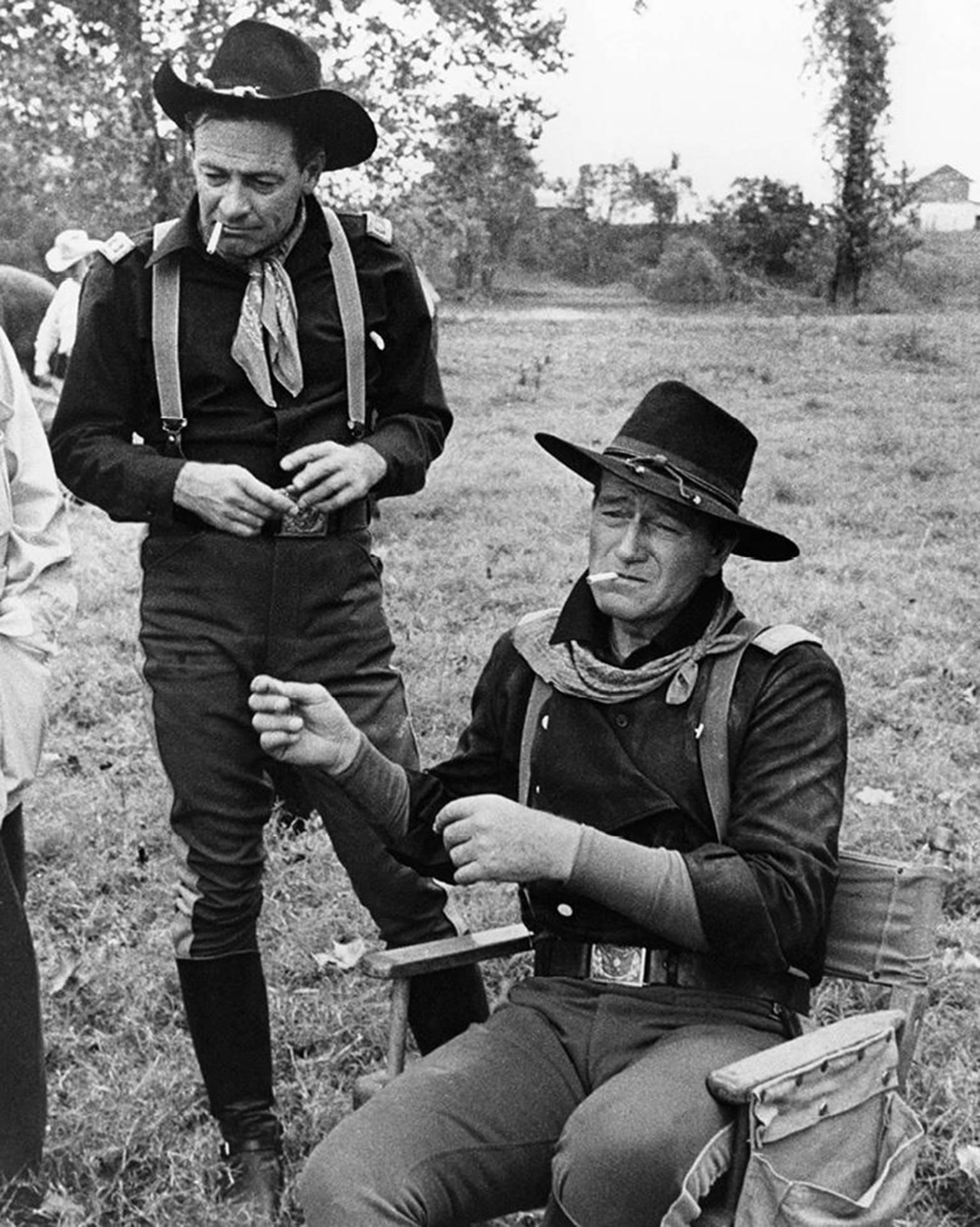 John R. Hamilton Black and White Photograph - John Wayne and William Holden, “The Horse Soldiers, ” 1959