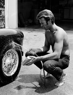 Vintage Clint Eastwood, washing his car, 1958