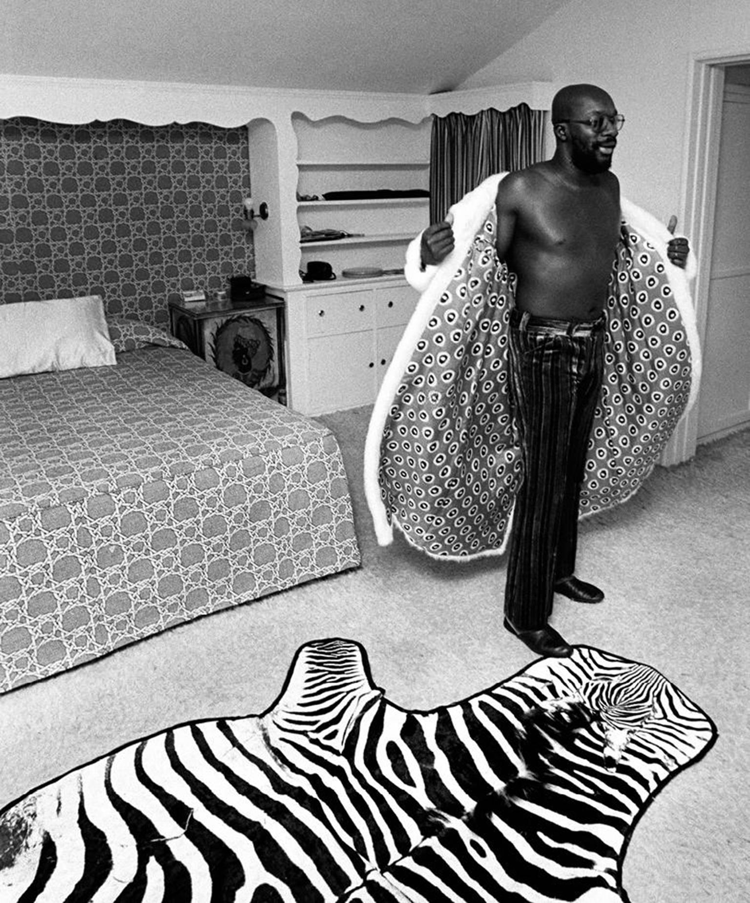 John R. Hamilton Black and White Photograph - Isaac Hayes, at home, Los Angeles, 1971