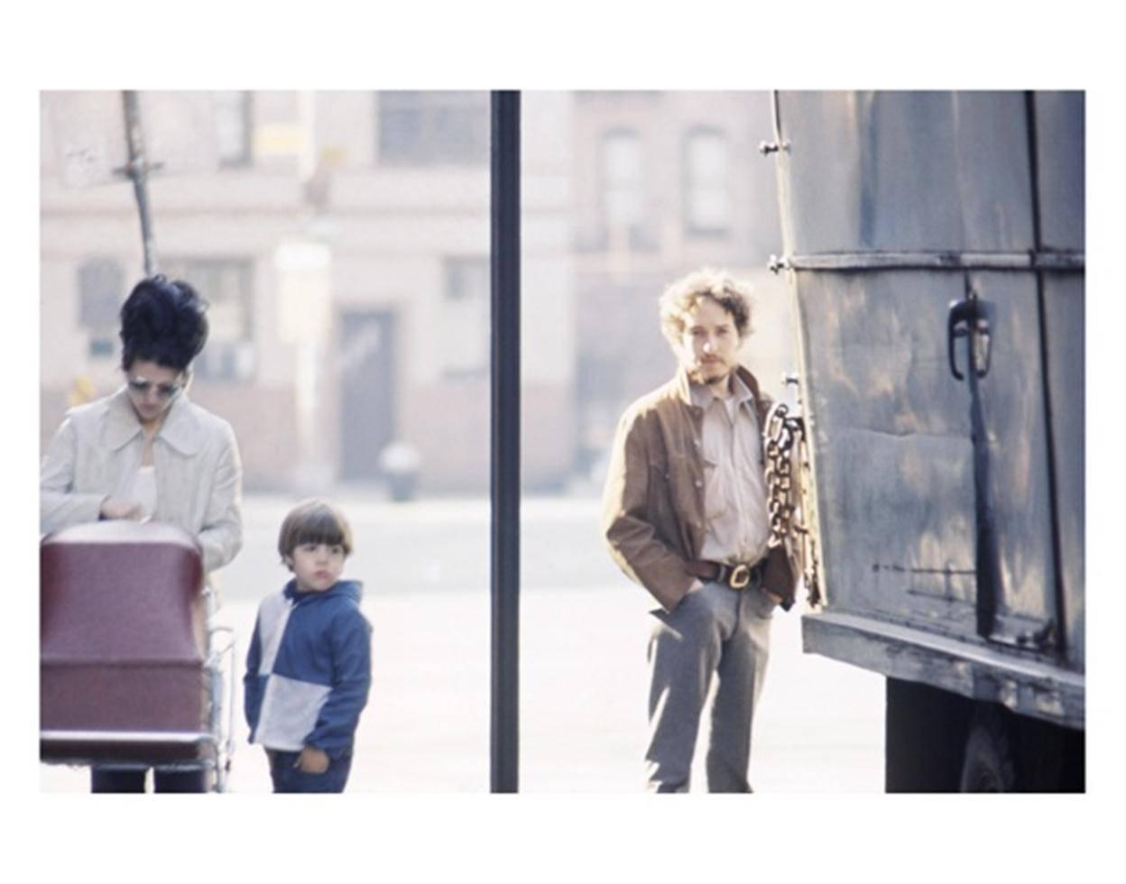 John Cohen Portrait Photograph - Bob Dylan, On Street With Woman, Child and Baby Carriage, 1970