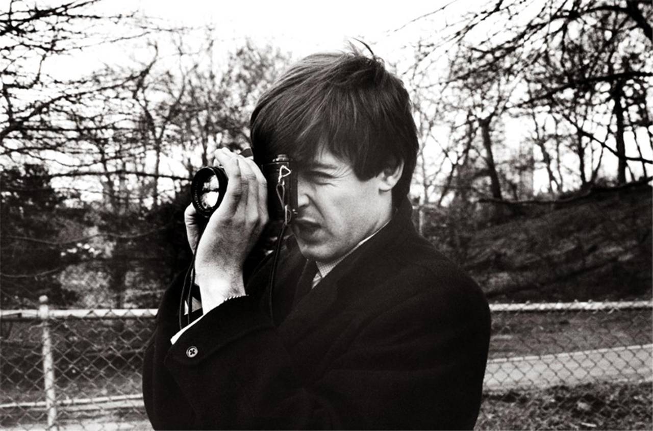 Terry O'Neill Black and White Photograph - Paul McCartney [with camera]