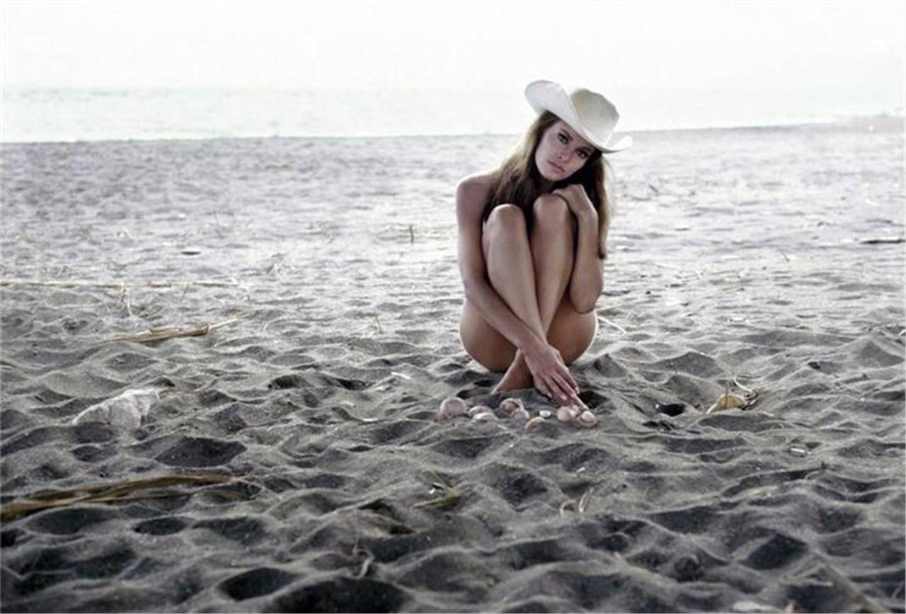 Terry O'Neill Color Photograph - Raquel Welch on the beach